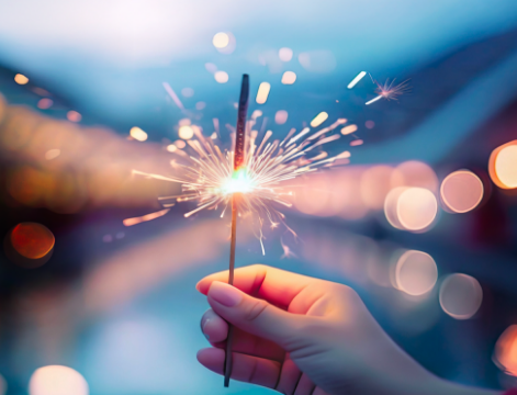 Gentleman sitting hunched over at a desk angrily tying at an old computer.
